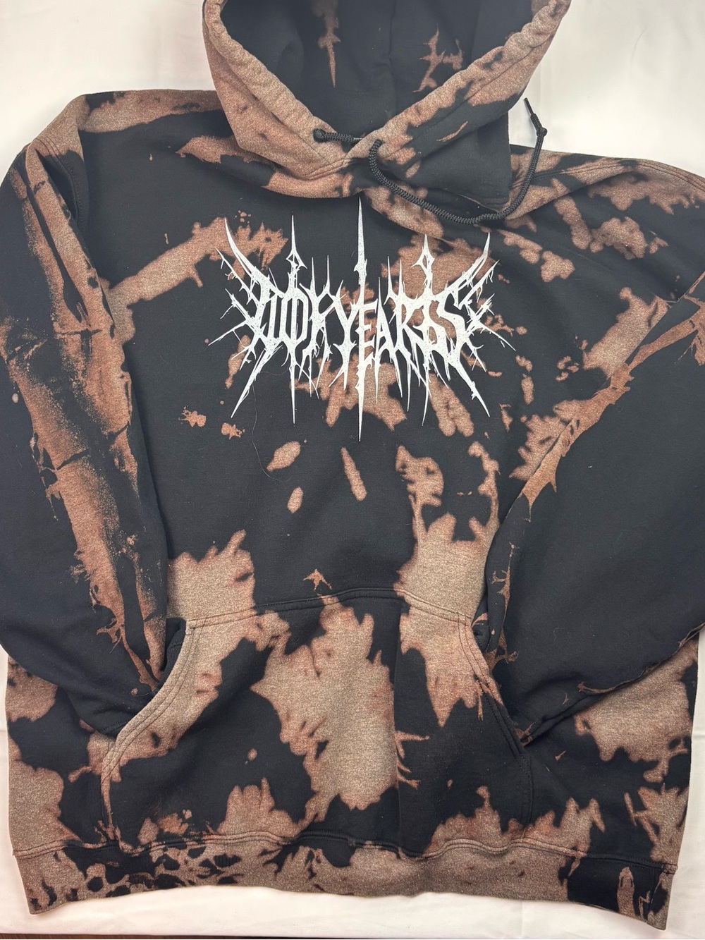 10 Years official band merch.  Bleached Black & Brown Graphic Hoodie